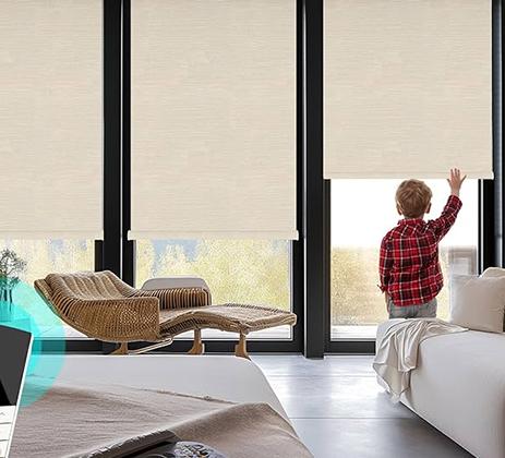 Cordless roller blinds with spring systems